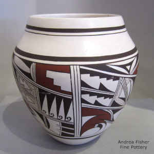 Bird element, medium shard and geometric design on a polychrome whiteware jar