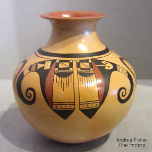Bird element and geometric design on a polychrome jar