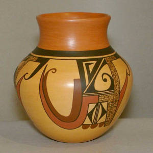 Shard, bird element and geometric designs on the body of a yellow ware jar with a red neck