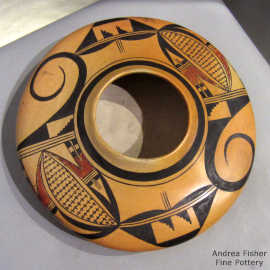 Bird element, kiva step and geometric design on a polychrome Sikyátki-style bowl