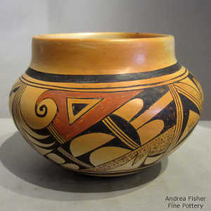 Bird element and geometric design on a polychrome jar