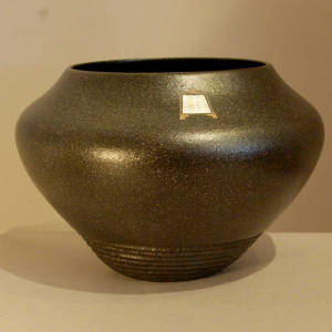 Sterling silver inlay in a micaceous black jar