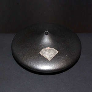 Sterling silver Shifting Sands inlay and an organic opening on a black micaceous seedpot