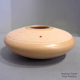 Salmon and pink jar with a Shifting Sands surface and an inlaid stone