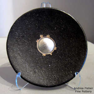 Inlaid Shifting Sands design sterling silver on a black micaceous plate