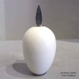 White seed pot with a Sterling Silver Shifting Sands design lid
