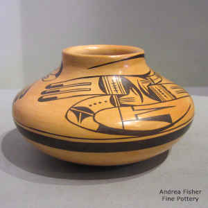 Bird element and geometric design on a polychrome jar