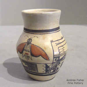4-panel moth and geometric design on a miniature polychrome jar