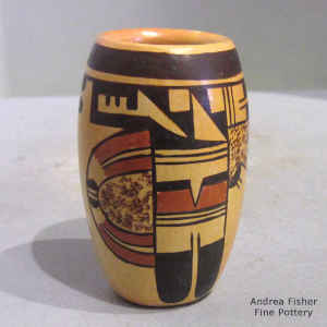 A bird element and geometric design on a miniature polychrome jar