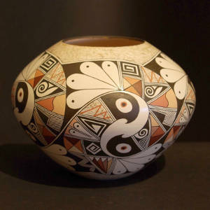 Bird element and shard design on a polychrome whiteware jar