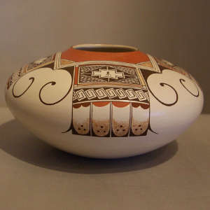 Black and red four direction bird element design on a whiteware jar