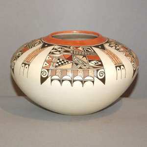 Red and black four direction bird element and shard design on a whiteware jar