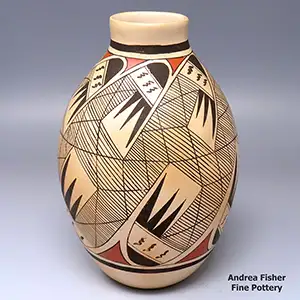 A polychrome jar decorated with a classic migration pattern design