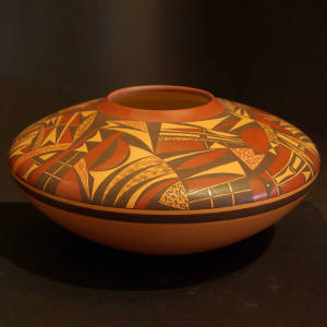 Polychrome shard and geometric designs on a yellowware jar