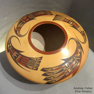 Bird element design on a polychrome yellow ware jar