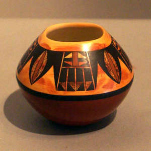Bird element and geometric design on a polychrome jar