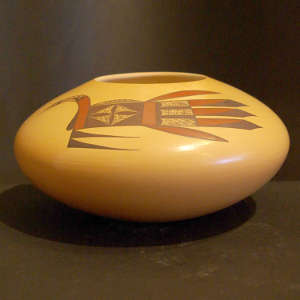 Bird element design on a polychrome yellowware jar