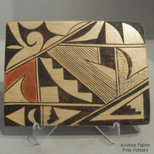 Red and black Sikyatki shard element design on a yellow ware tile