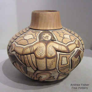 Dancer, ear of corn and geometric design carved, etched and painted on a polychrome jar