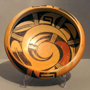 Bird element and geometric design inside and out on a polychrome jar