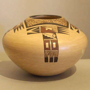 Four direction red and black eagletail design on a yellowware jar