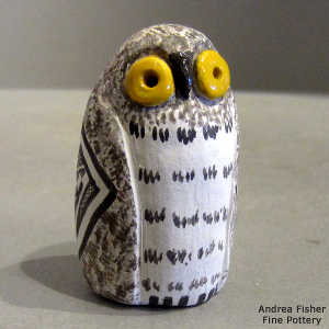 Geometric design on a miniature polychrome owl