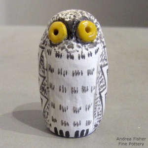 Polychrome owl figure with geometric design