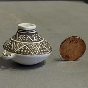 Miniature black and white pot