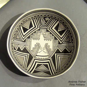 Thunderbird and geometric design on a black and white bowl