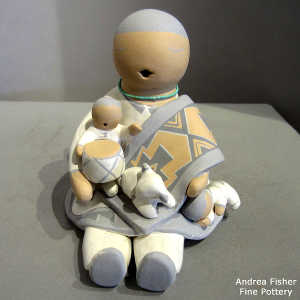 2 children and a lamb on a grandmother storyteller