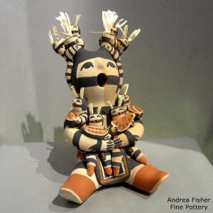 8 children on a koshare storyteller