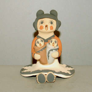 Two children on a grandmother storyteller