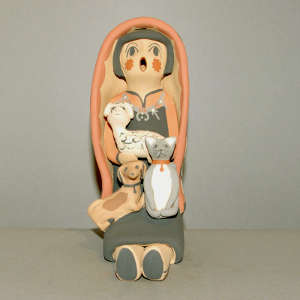 Three animals on a grandmother storyteller in a manta