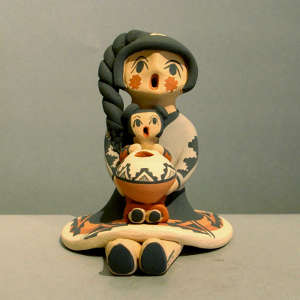 One child and a pot on a grandmother storyteller