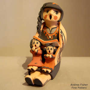 2 children and a book on a grandmother storyteller