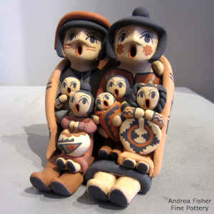 Grandparents storyteller with a blanket, 6 children and a pot