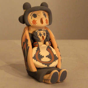 One child with a basket on a female storyteller