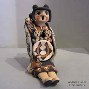 Four chidren and a welcome basket on a grandmother storyteller