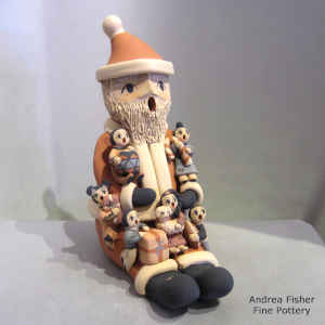 6 children on a Santa Claus storyteller