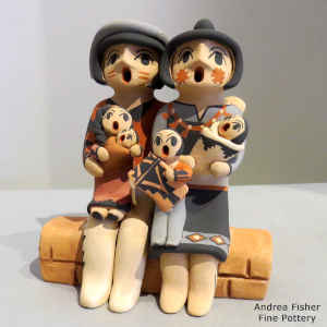 4 children on a grandmother and grandfather storyteller