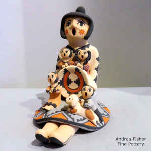 Four children on a grandmother storyteller with a welcome basket and a puppy