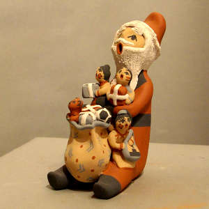 4 children and a bag of gifts on a Santa storyteller