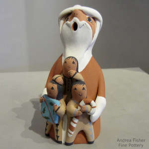 3 children on a Santa Claus storyteller