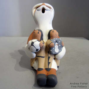 Two children on a Santa Claus storyteller