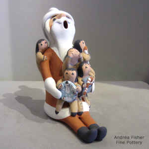 5 children on a Santa Claus storyteller