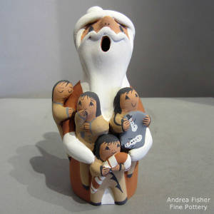 Four children on a Santa Claus storyteller