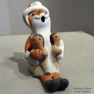 Two children on a Santa Claus storyteller