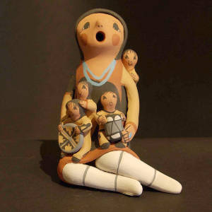 Four children on a grandmother storyteller