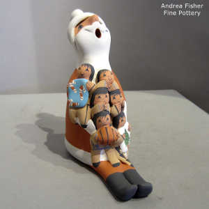 6 children on a Santa Claus storyteller