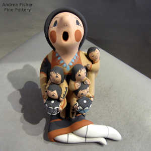 5 children and 2 drums on a grandmother storyteller